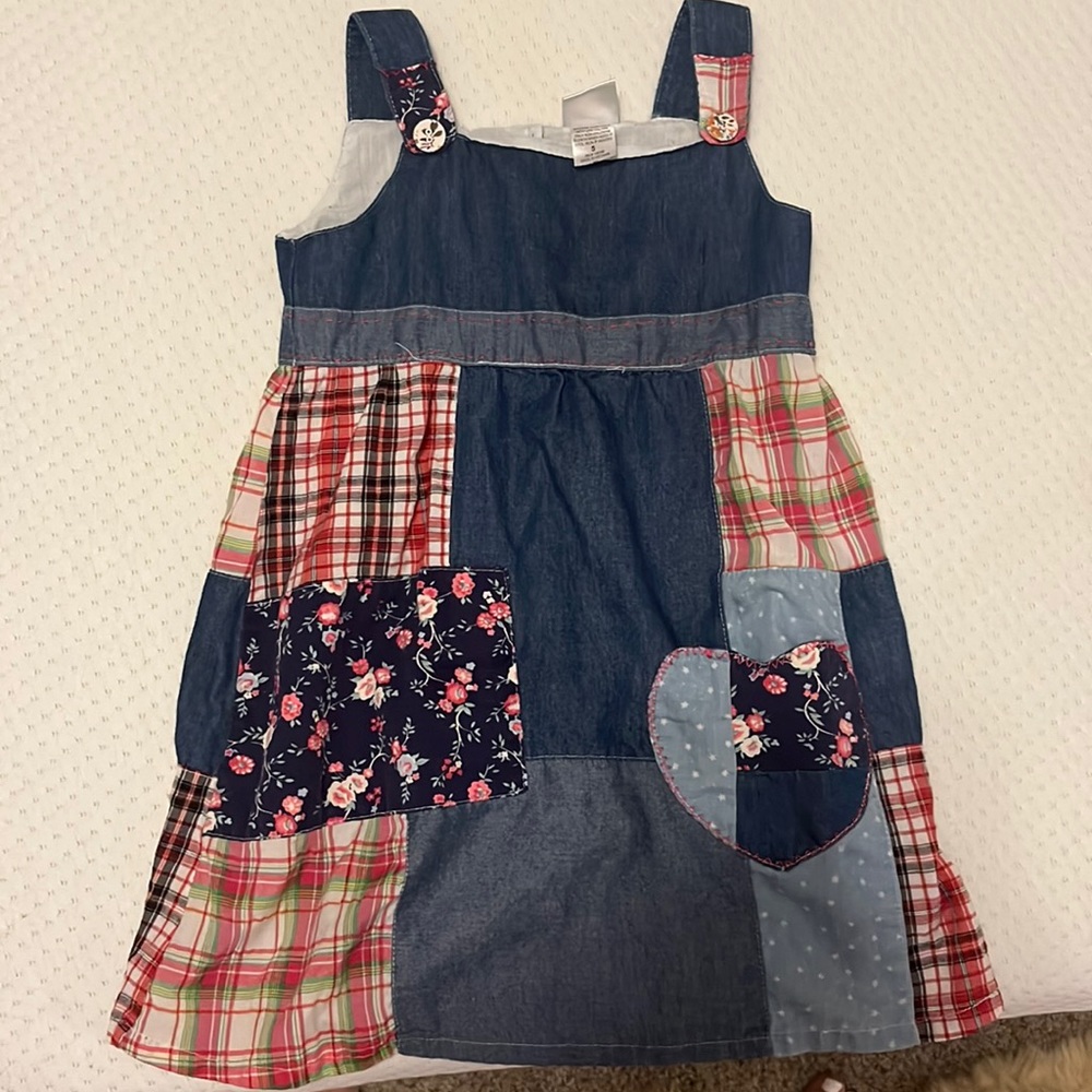 The Silly Sissy boutique dress. Worn once size 5. Adorable patch work + pocket